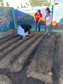 Here is a picture of our Spring Planting even with the second round of youth. Due to covid we held separate events to cohort kids and have socially distanced planting events. These young women are part of our youth group who are taking care of the garden this cycle. 