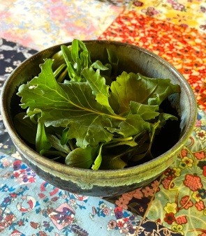 Pottery bowl and salad by Sharon