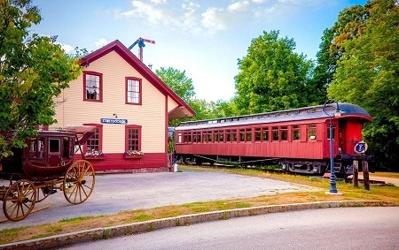 Photo of the Contoocook railroad depot, passenger rail coach, and Concord Coach