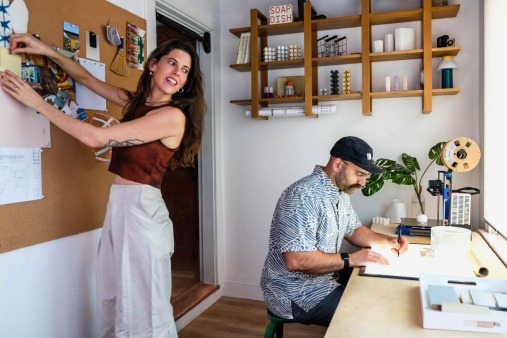 J.R. and George Coffin working in the Dwelly Office