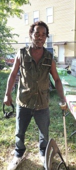 Free Herbal Remedies Workshop, Participant with leg pain makes a herbal salve for leg 
