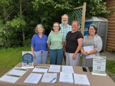 FFoELC group tabling at ELC Ice Cream Social, passing out information to parents for the new school year