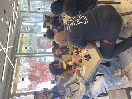 Youth Playing Chess In McDonald's