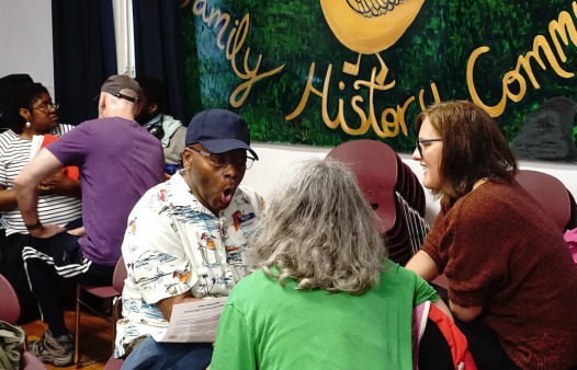 Cambridge residents learning about the Cambridge Community Land Trust