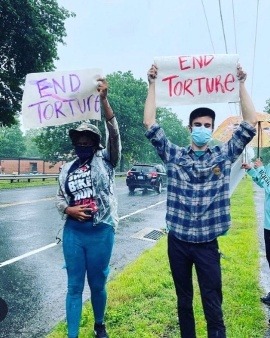 end torture protesters