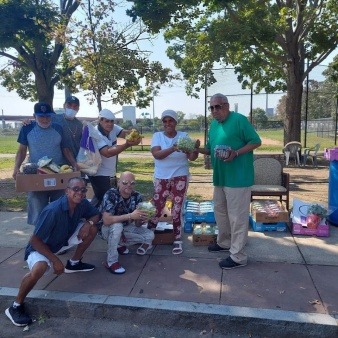 Food for neighbors at a park. These folks play chess and socialize on days with good weather.