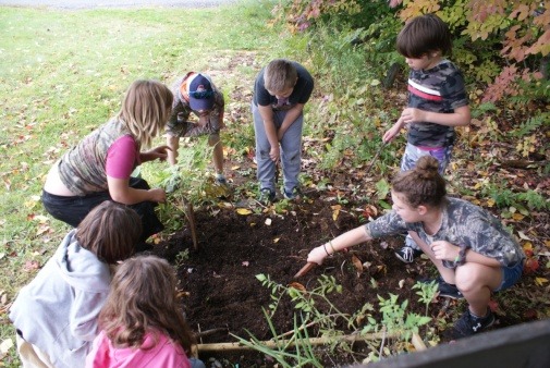 Middle School students gardening