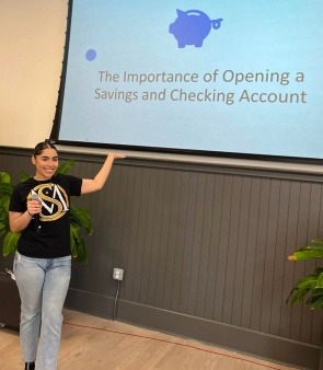 Community members attending a Sin-cere Multiservice Inc. workshop focused on savings strategies and budgeting techniques to promote financial stability.