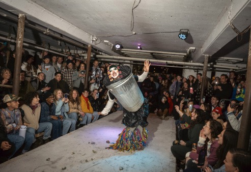 Drag clown dressed in a garbage can doing an environmental performance (credits to GP Galvaggio)