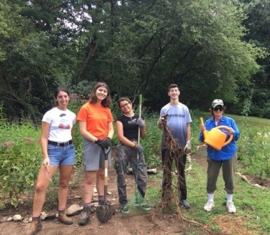 High School, college students, and MS4B director at Kennard Park