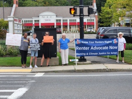 Members of Housing and Climate Justice for Acton hold a Stand Out to raise awareness of the need for a Renter Advocate