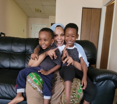 Grandmother Adoum with grandchildren
