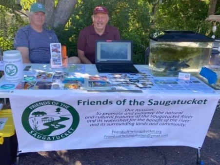 Friends of the Saugatucket board members educating the public at a local event.