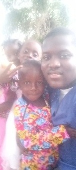 Children in the community with the Head of Group in samai town community. After session with them on Their public speaking and hygiene issues