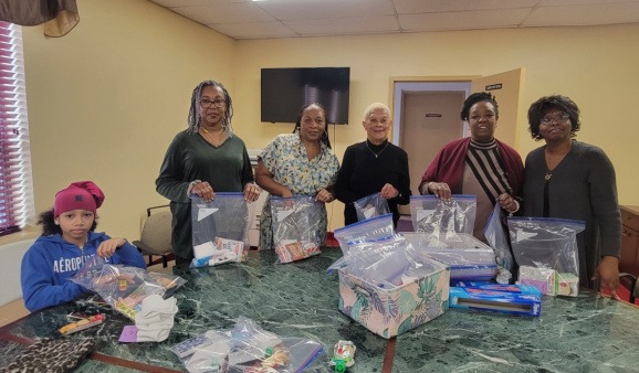 WOM packing team Packing for the homeless and shut in