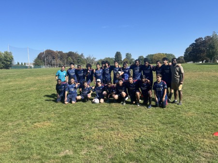 Our youth posing for a picture before a soccer game