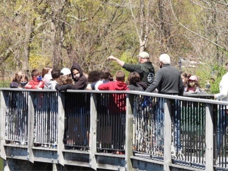 Friends of the Saugatucket President educating local school children about migratory fish in the Saugatucket River.