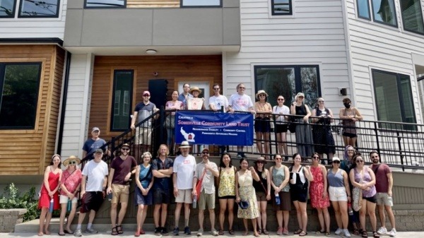 Somerville CLT Volunteers in front of 5 new affordable homeownership condos