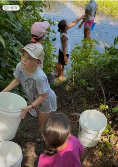 Mashpee Youth Hauling Water to feed the garden July 2025