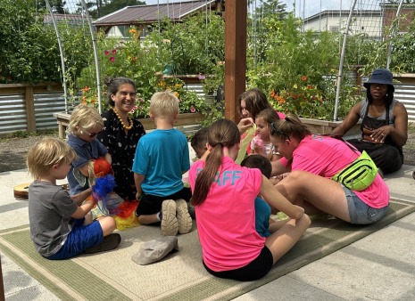 Music time during BCG’s four-week Let’s Grow Together program, where gardening, art, and music give children different ways to learn, participate, create, and belong. Let’s Grow Together Summer Camp