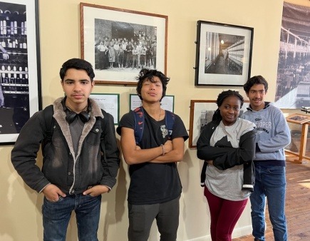 Students posing like children in historic Lewis Hine Child Labor photos Students posing in front of Lewis Hine Child Labor photos from the early 1900s