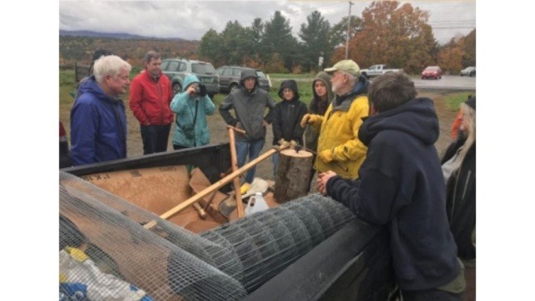 Local resident Peter Leonard volunteered to teach others how to use a scythe.