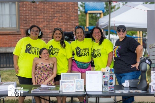 Pictures of Staff and Volunteers who participated in the Nashua Summer Stroll with 5 art stalls for free to the public and estimated 2k in attendance