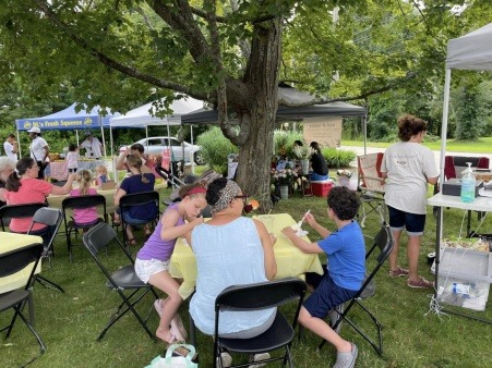 Having a snack under the shade of the trees