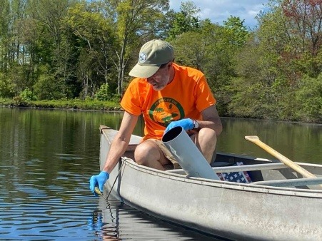 Friends of the Saugatucket member monitoring for water quality.