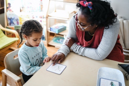 a child is getting an individual lesson 