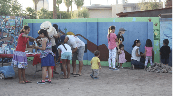 Here is a photo of our community garden mural project in 2018