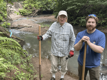 Community volunteer plant trees at Poor Brook, Springfield, MA