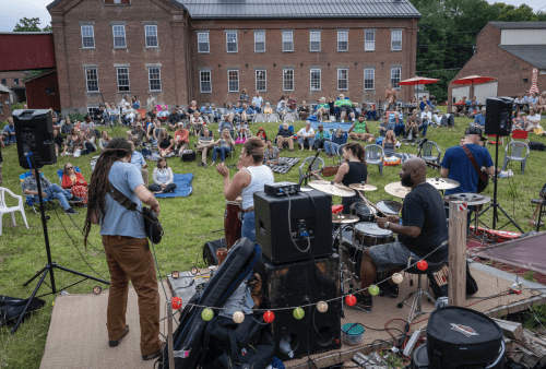 This is a view of a fundraiser concert that we hosted , from the musicians perspective (no cover for them yet!) This is a view of our current stage, without any cover for artists