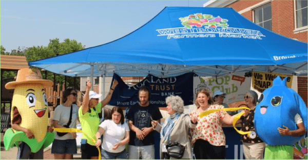 Opening Day with our State reps, and many community members helping to "Cut the Ribbon"