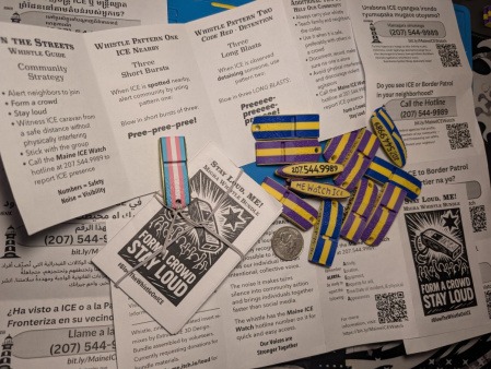 picture of a completed zine and whistles 