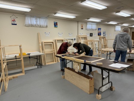 Stretching a layer of plastic over WD frame