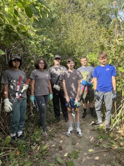 The Student Stewardship Team clears the trail to Mussachuck Beach. The Student Stewardship Team clears the trail to Mussachuck Beach.