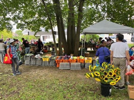 Summer produce customers shopping the abundance of summer produce