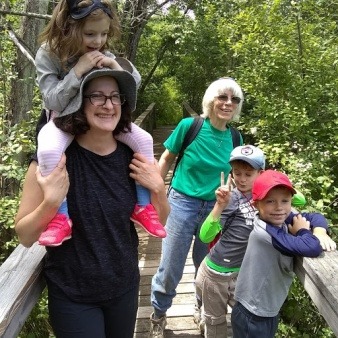 Community service project clearing trails at local conservation area