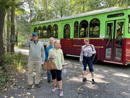 Sustainable York Tour guests get ready to board the trolley