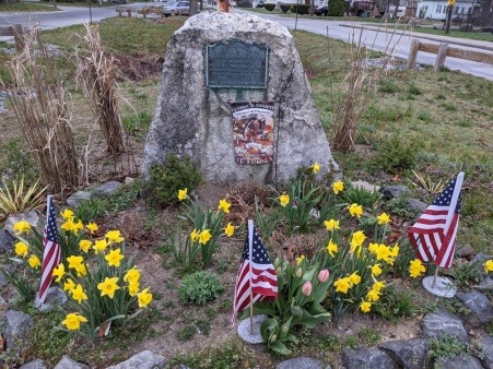 Weeding, clearing and replanting a Veteran's memorial