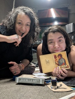 Yasamin and Jasmine planning the zine