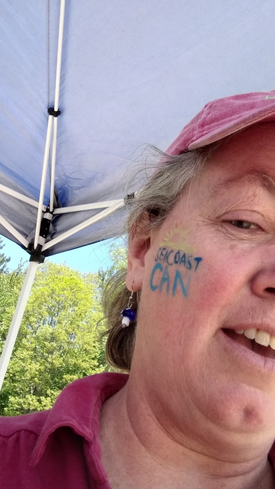 Board Member at our booth at Portsmouth farmer's market